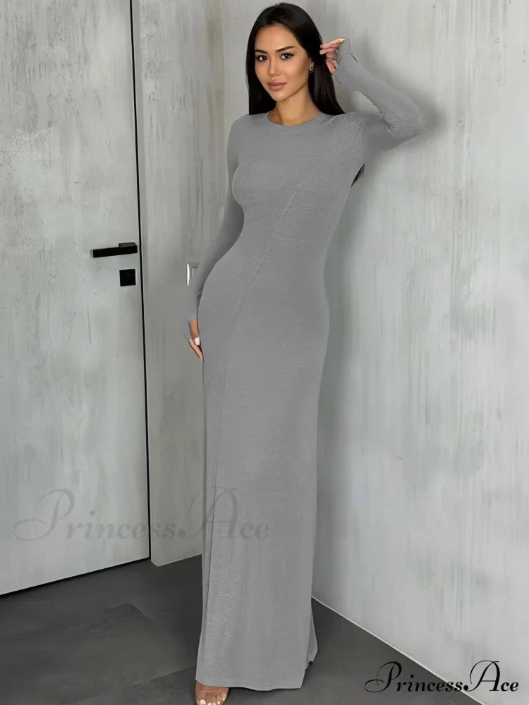 Black Maxi Dress With Long Sleeves And Sleek Silhouette