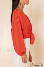 Blouse With Lace-Up Red Buttons Design