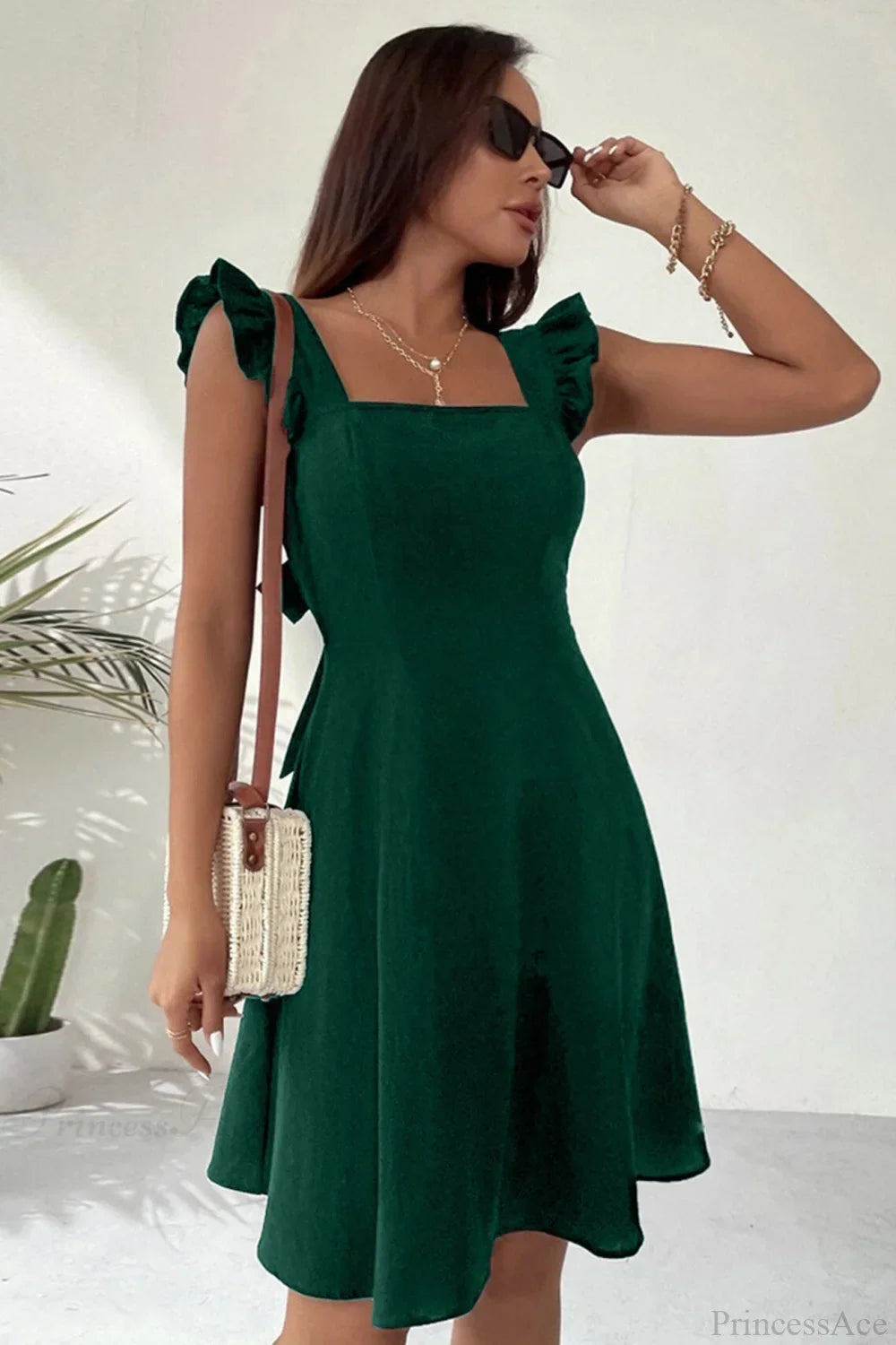 Sleeveless Mini Dress With Ruffle Tie-Back