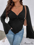 Top With Arm Plunge Flare Detail
