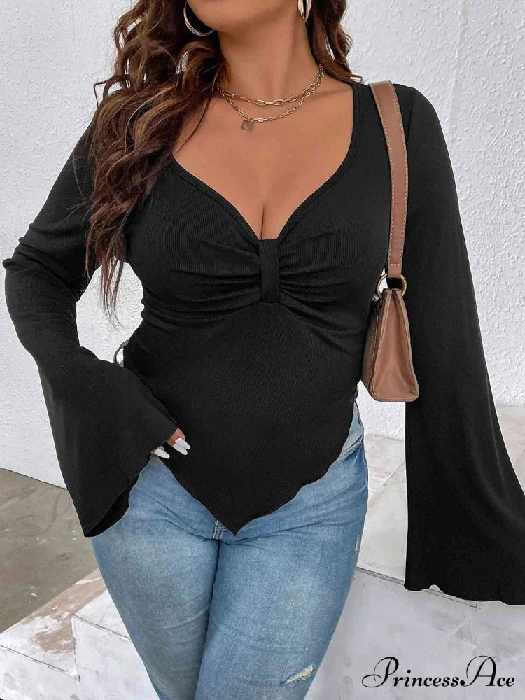 Top With Arm Plunge Flare Detail